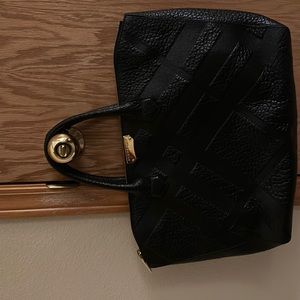 Gorgeous Burberry tote. A must see!